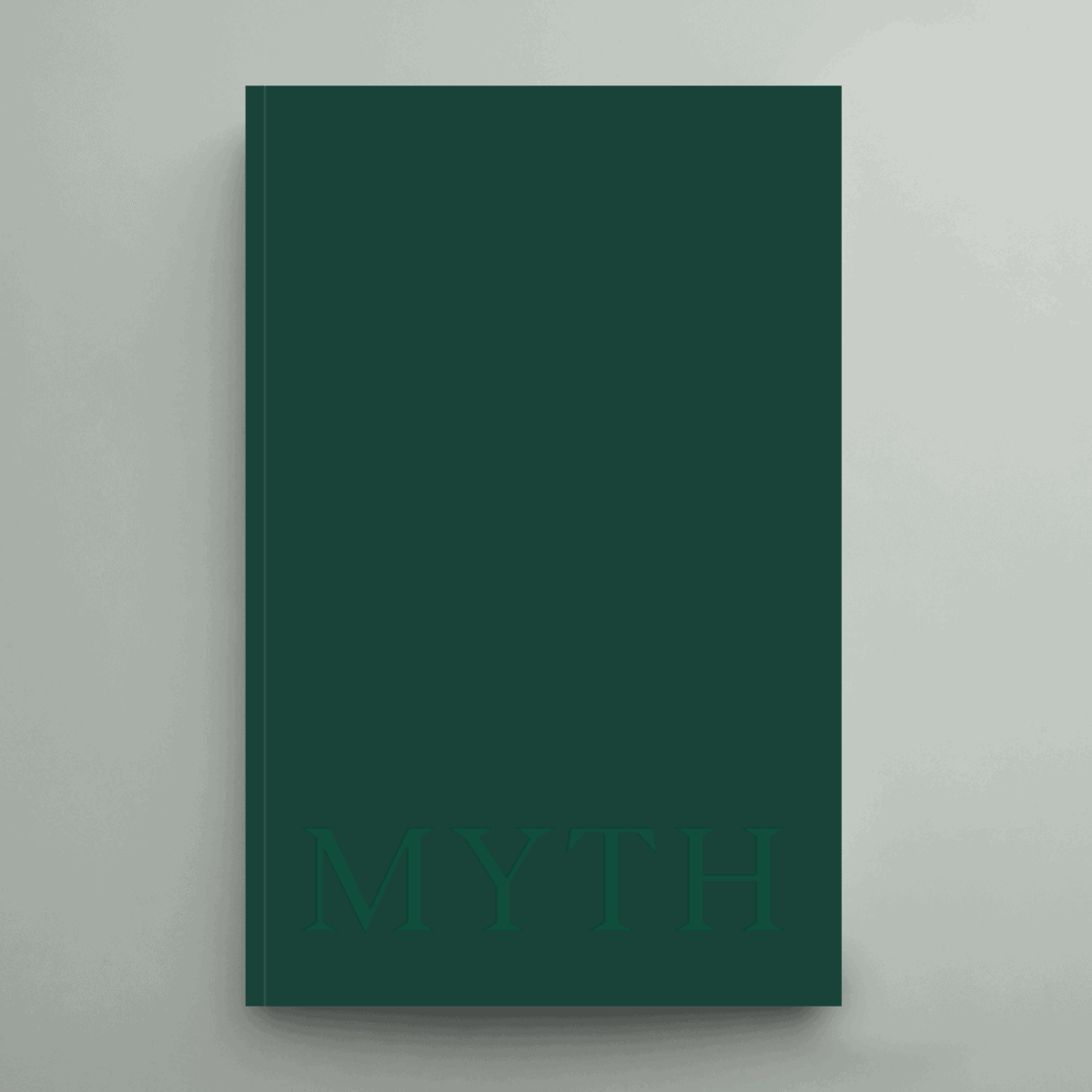Green hardcover book with MYTH text embossed cover
